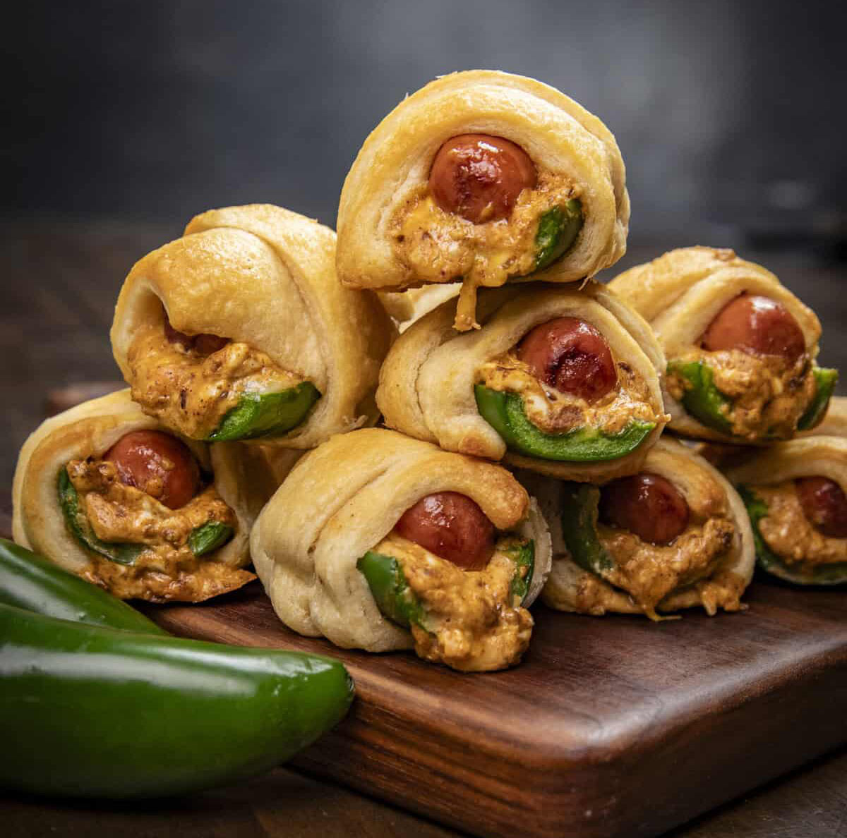 grilled jalapeno popper appetizer cooked on pit boss wood pellet grill on wood cutting board