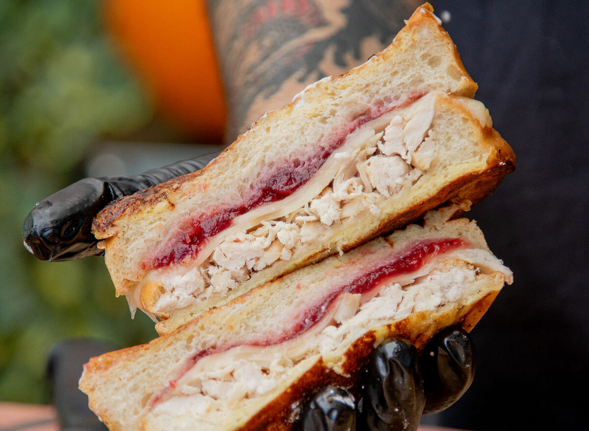 griddled Monte Cristo sandwiches with turkey, ham, and cranberry sauce cooked on pit boss flat top gas griddle